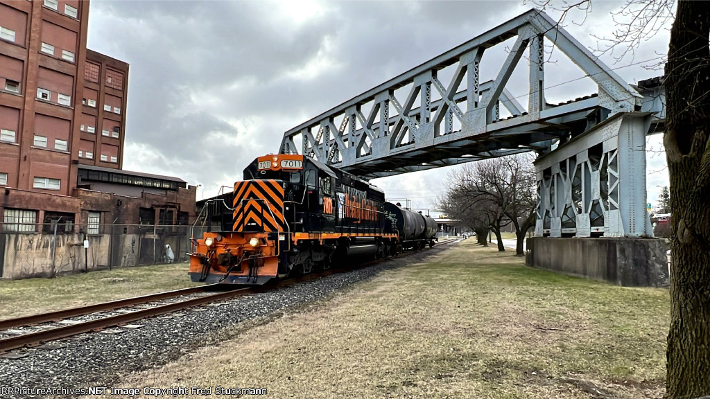 WE 7011 comes north under the A&BB RR bridge that has been silent for some 30 years.